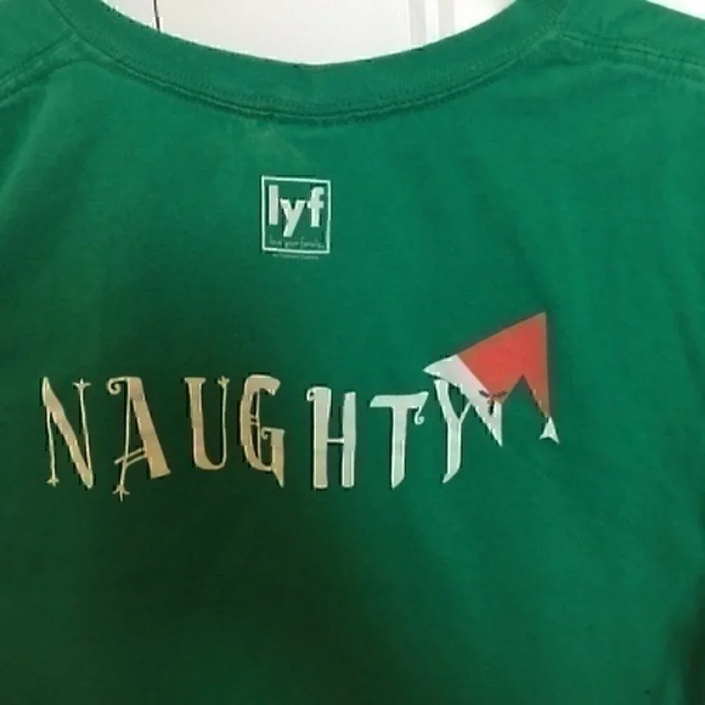 Youth size medium Naughty /Nice Christmas T-shirt